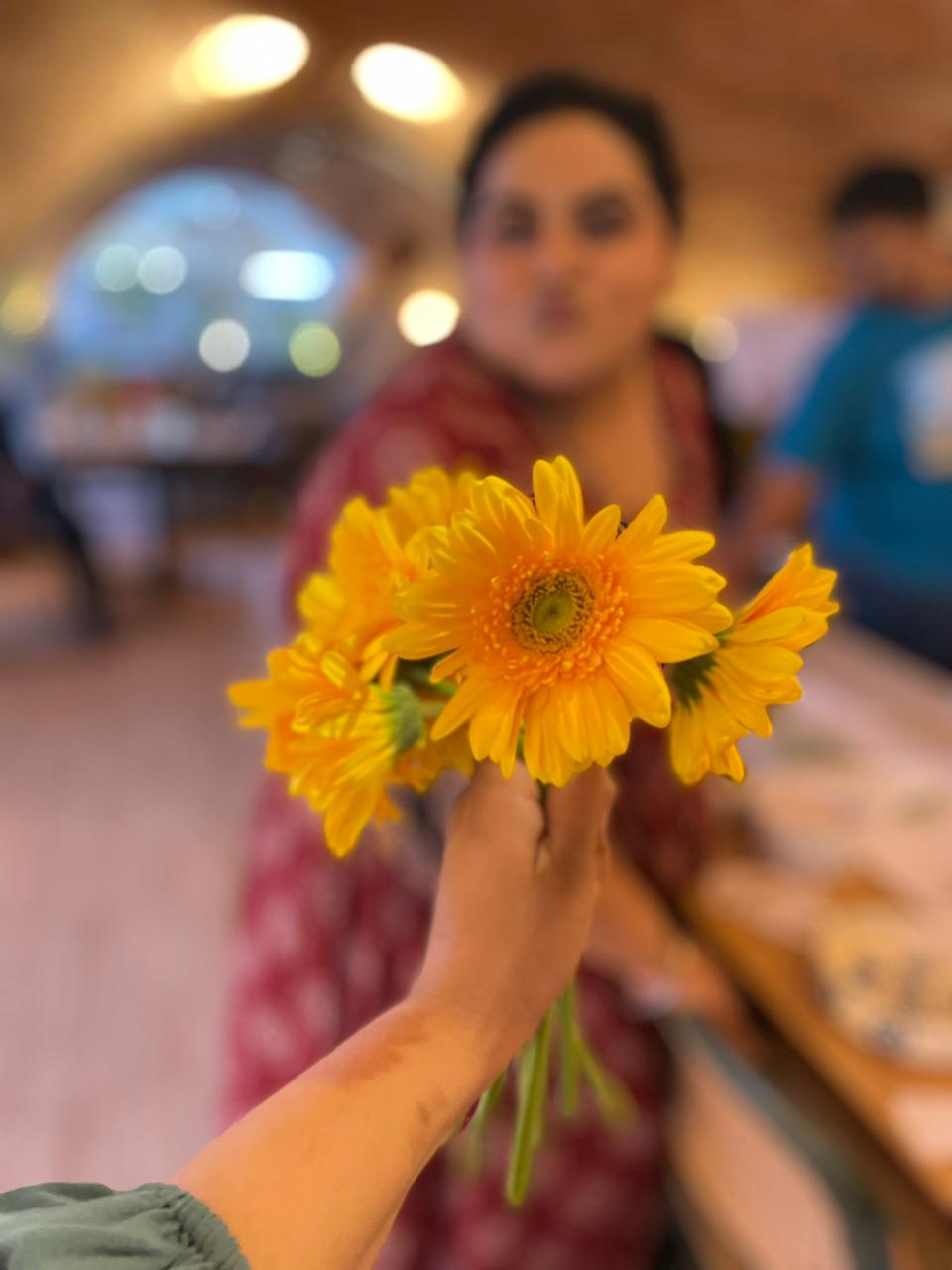 Girl holding flowers